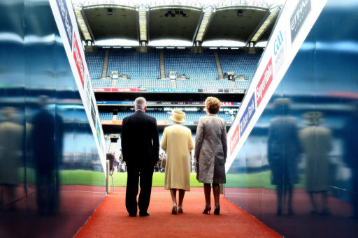 Queen Elizabeth II, President Mary McAleese and GAA President Christy Cooney walk out the tunnel towards the pitch at Croke Park. (Pic: Maxwells)