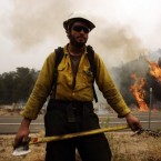 A firefighter protects a backburn to fight the Wallow Fire in Nutrioso, Arizona. (AP Photo/Marcio Jose Sanchez)