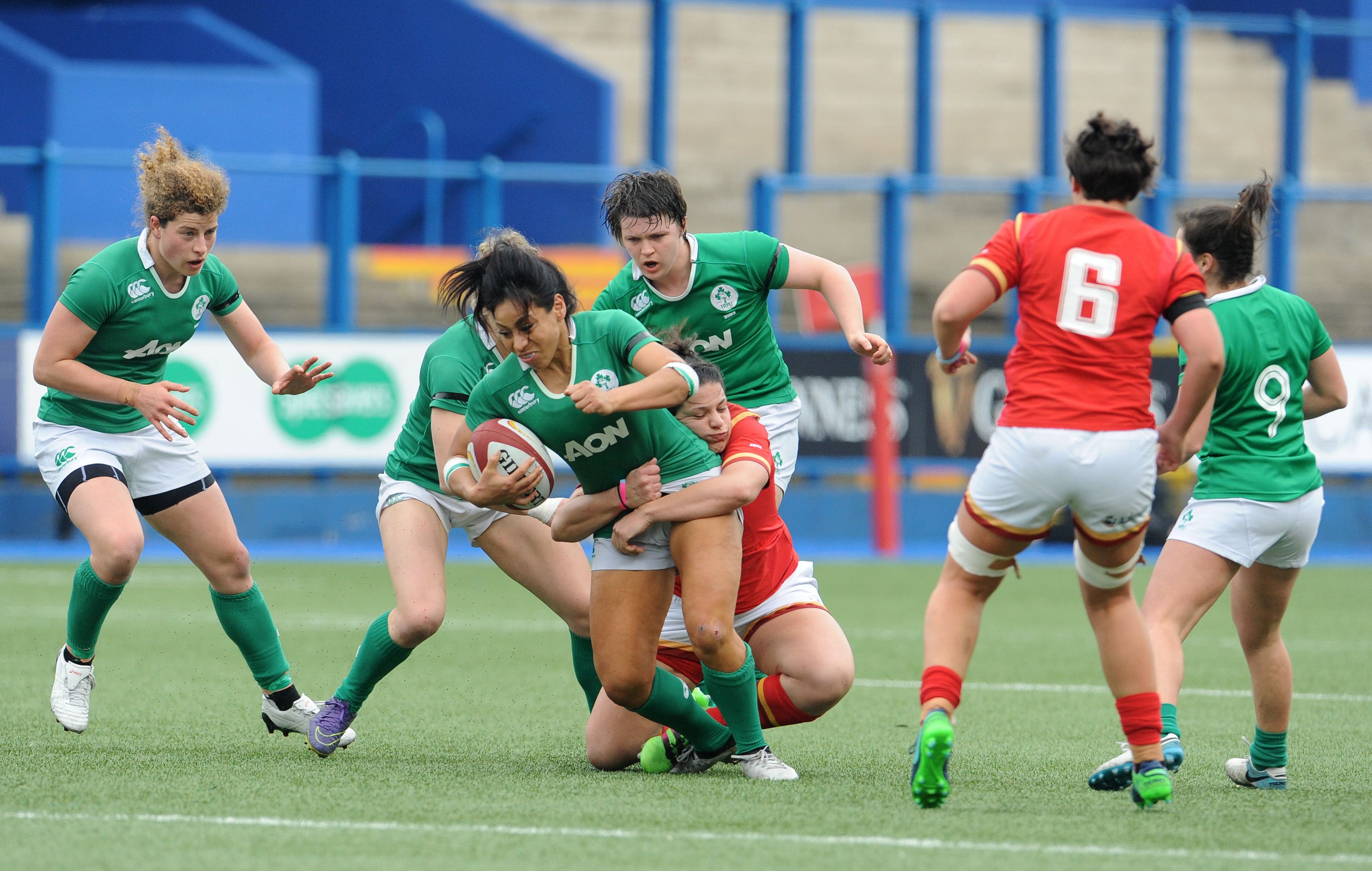 Sene Naoupu is tackled by Rebecca De Filippo